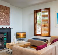 Chic Two-storey Cottage with Darling Harbour Views - Hervey Bay Accommodation