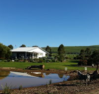 Linger Longer Cottages - Tourism Hervey Bay