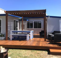 Shellharbour Beach Cottage - walk onto Patrolled beach with flags in summer - Tourism Hervey Bay