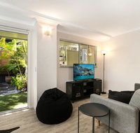 Tropical Townhouse With Two Courtyards and Pool - Tourism Hervey Bay
