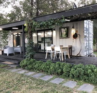 Absolute riverfront shipping container cabin - Tourism Hervey Bay